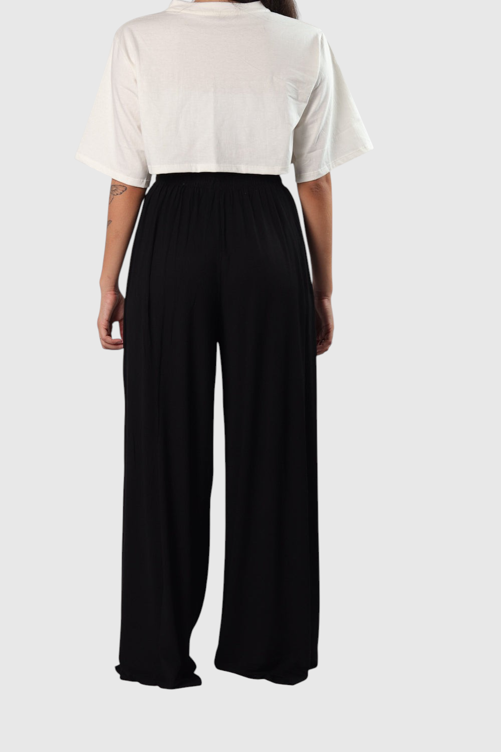 Pantalona preta LA MAGIE | Roupas Femininas Básicas e Estilosas em viscolycra com cós elástico, vista de costas.